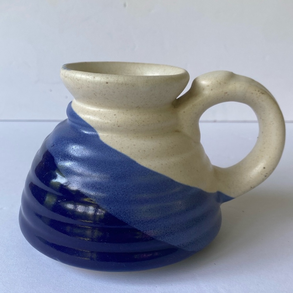 -Vintage Stoneware blue and white travel mug.